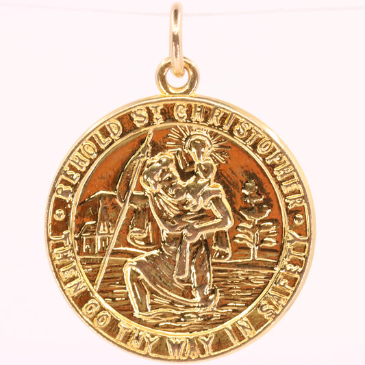 A round gold Saint Christopher medal pendant with a polished bail, featuring an embossed depiction of Saint Christopher carrying the Christ child across water, set against a plain white background.