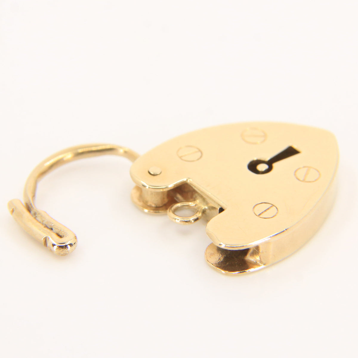 A small gold-toned metal padlock with a curved shackle and a small black keyhole cutout, photographed on a plain white background.